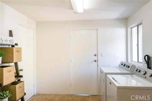 Separate laundry room/pantry area with direct access to garage