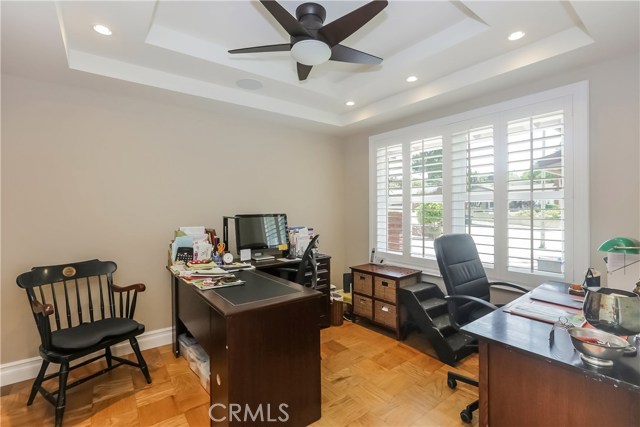 Fourth bedroom currently being used as office, light, bright room, coved ceilings, led lighting, plantation shutters, new dual paned windows.