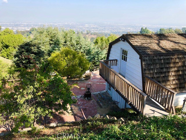 Views to the north from the large, flat side yard. Barn includes extensive additional space with two floors and 3/4 bathroom.