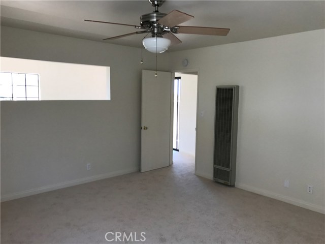 Master bedroom with new carpet, wall cut open for ocean views