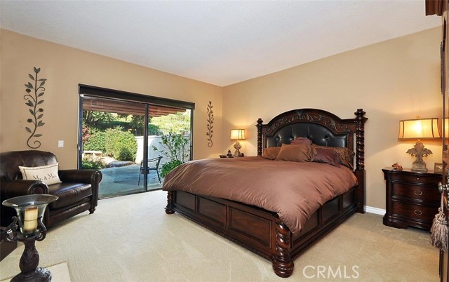 Master bedroom with direct access to private yard