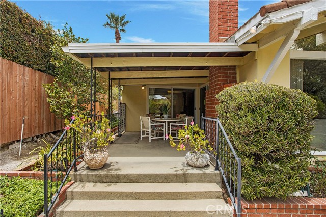 Step up to the covered patio