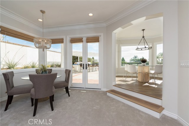 View of the casual eating area from the family room. Family room opens to the rear yard.