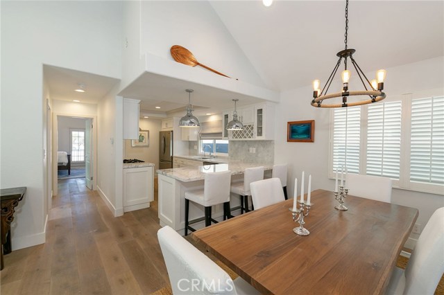 dining room, breakfast bar, and kitchen