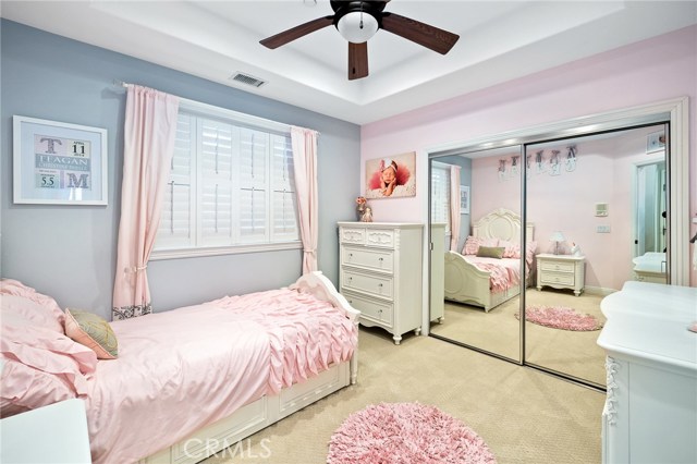 Downstairs bedroom with window shutters