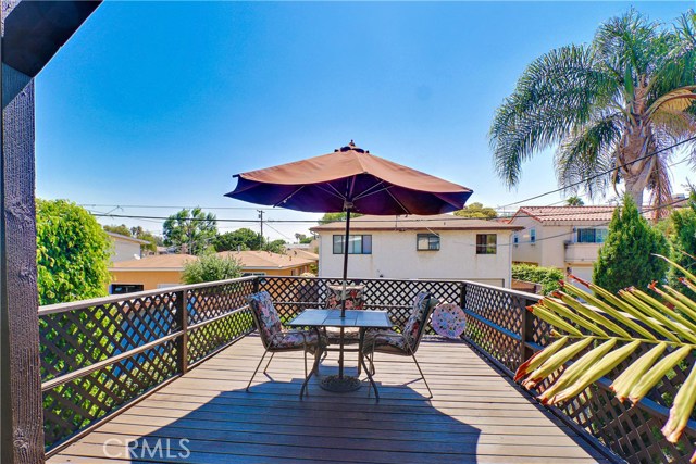 Large deck located off the master bedroom w stairs that lead to the lower yard!