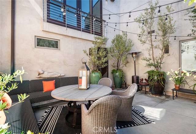 Private center patio is the perfect spot for quiet dining or catching up on a book.