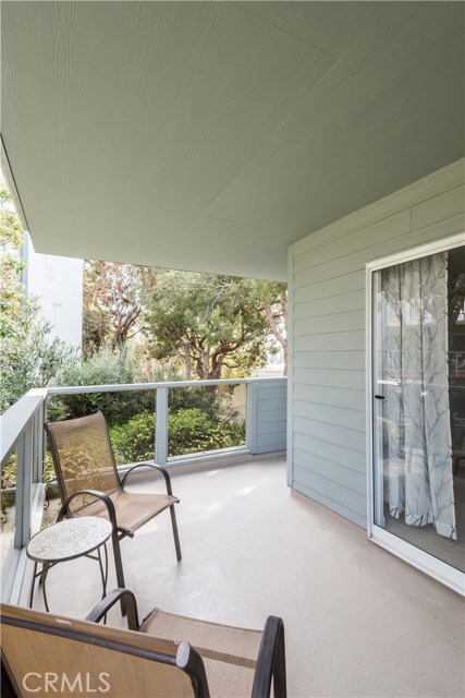 Oversized wrap-around deck has ocean view & large storage closet on the side.