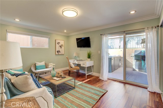 Coastal style downstairs bedroom #1 with private backyard access