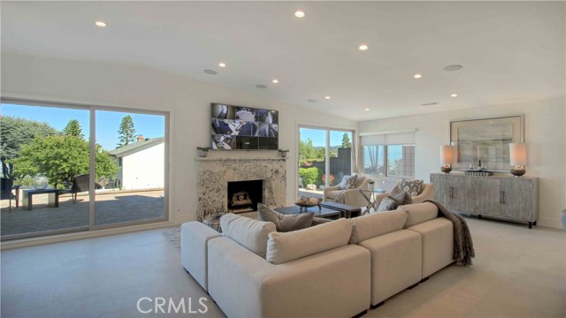 Living area, 10' sliding matching doors to patio