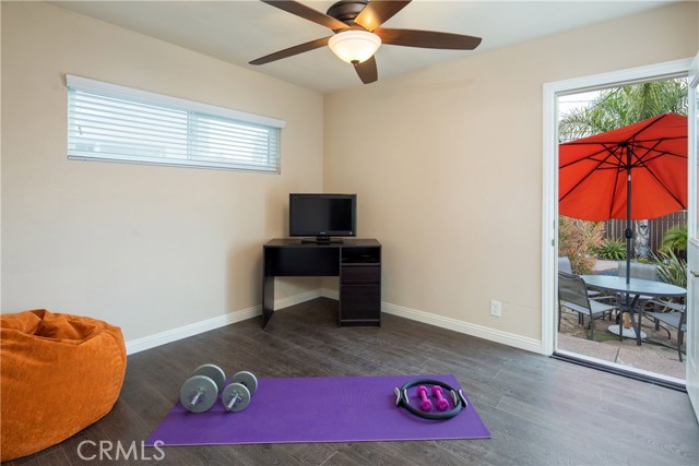 Bedroom #3 with easy access to the backyard, lounge area, and pool.