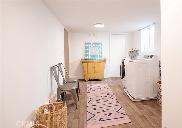 HUGE utility room with tons of storage including walk-in closet.