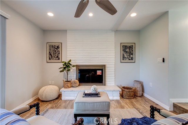 Enjoy the cozy fireplace with brick details