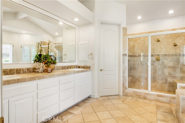 The master bathroom is your personal spa with large walk-in shower with dual shower heads, soaking tub and double sinks.