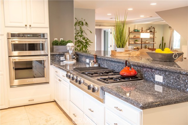 Kitchen provides clean lines and access to living areas.