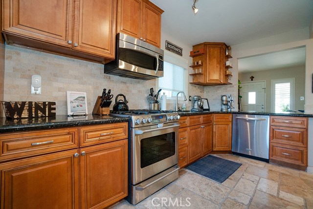 View of kitchen facing front door.