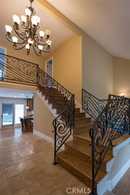 Custom designed staircase reconfigured during 2010 remodel. Leads to 3 bedrooms and 2 full baths.