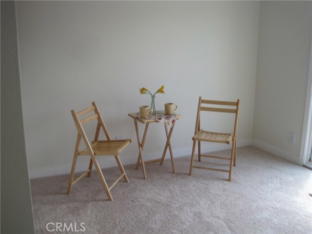 Spacious dining area opening to balcony