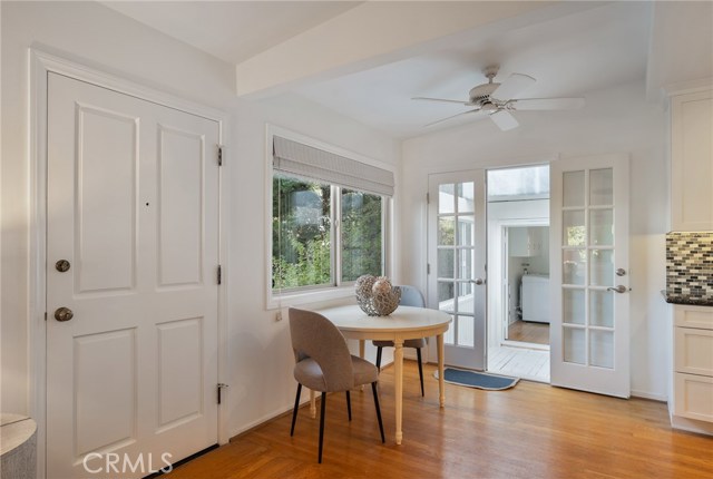 Dining area and door to the separate stair case/entrance.