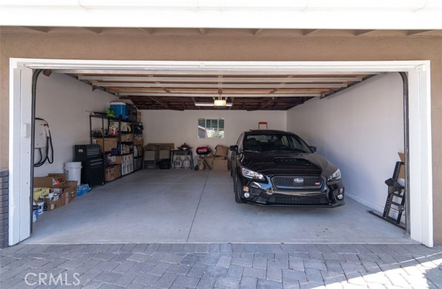 Finished garage with electric car charging station