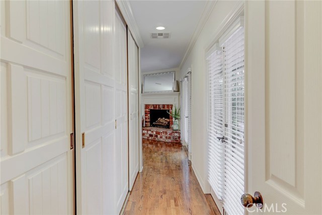 Master bedroom hallway is lined with closet space galore!