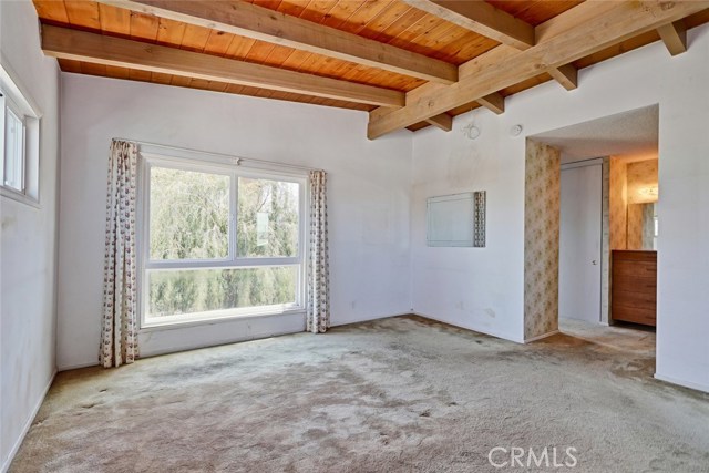 Master Bedroom high ceilings and entrance to closets and master bath.