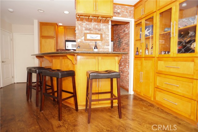 Custom cabinets with rustic brick.