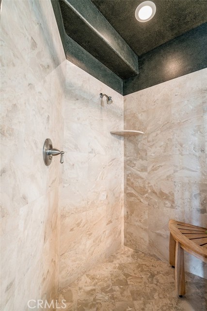 Separate travertine shower in master bathroom