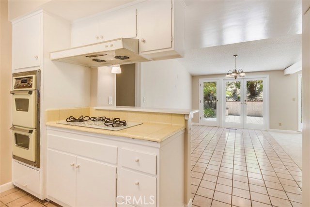 Kitchen opens up to the dining room so your still involved even when finalizing the menu.