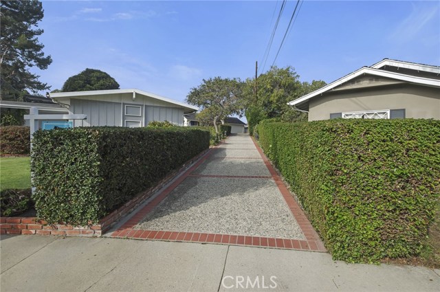 LONG DRIVEWAY BEHIND OTHER HOMES! VERY PRIVATE!