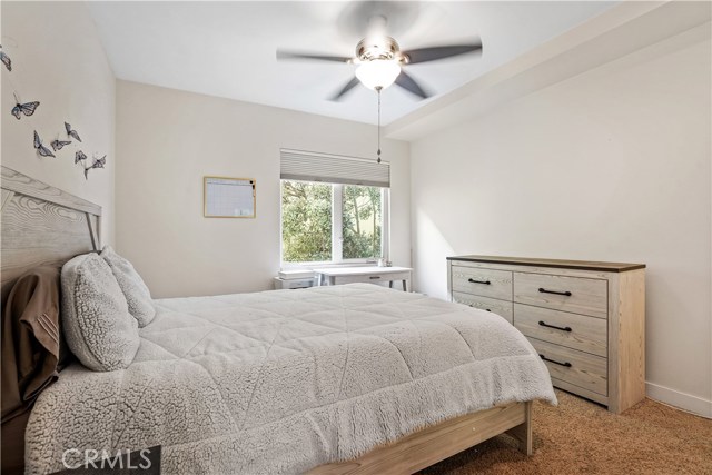 2nd bedroom with nice light and ceiling fan