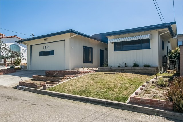 The home was recently painted inside and outside and has new carpeting throughout. There is an ocean peak and a second story addition could give panoramic views.