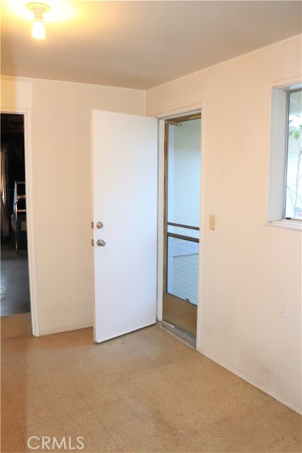 Laundry Room - between kitchen and garage.  Door to front yard from Laundry Room.