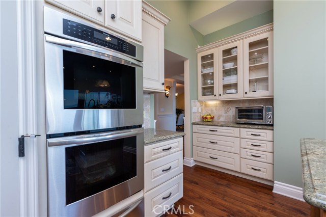 Back side of the kitchen, standing near the walk-in pantry.