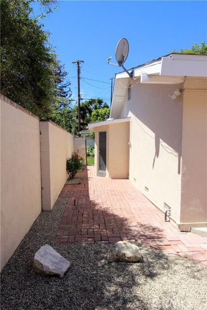 A steam/shower room and extra half bath outside