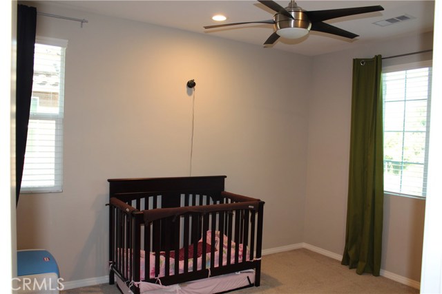 Bedroom #3 with ceiling fan.