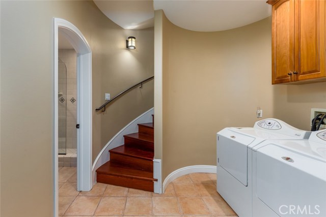 Ground floor laundry area with lots of storage and plenty of space.