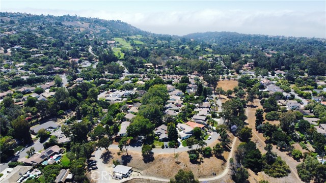 This little traveled street is a hidden gem in the beautiful neighborhood of Valmonte.  Close enough to walk to golf and tennis.