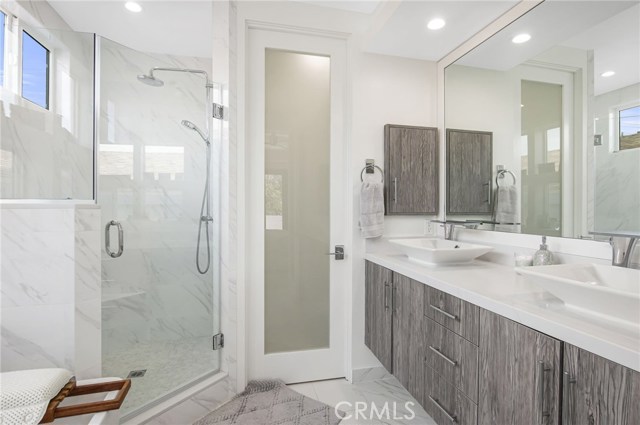 2nd Floor Master Bathroom - Dual Vanity with built-in cabinets.