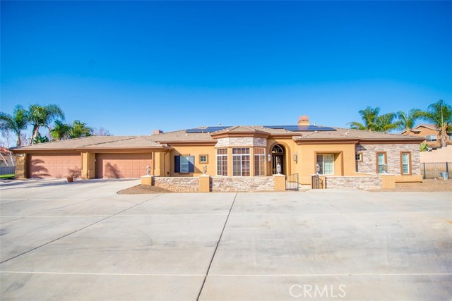 Front View of the House.  Stone, Stucco and beautiful Amberhill features.