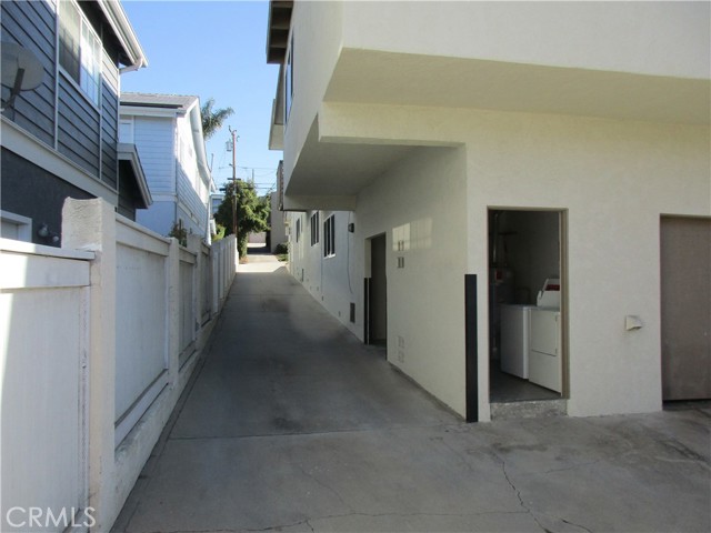 West side of property. Driveway looking toward street