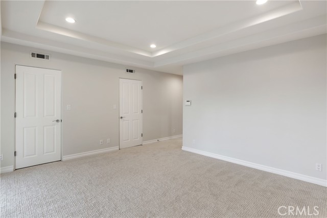 Access to master walk-in closet through two doors.