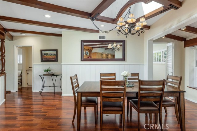 The dining area is at the heart of the home and looks out into the natural backdrop of the outdoors.