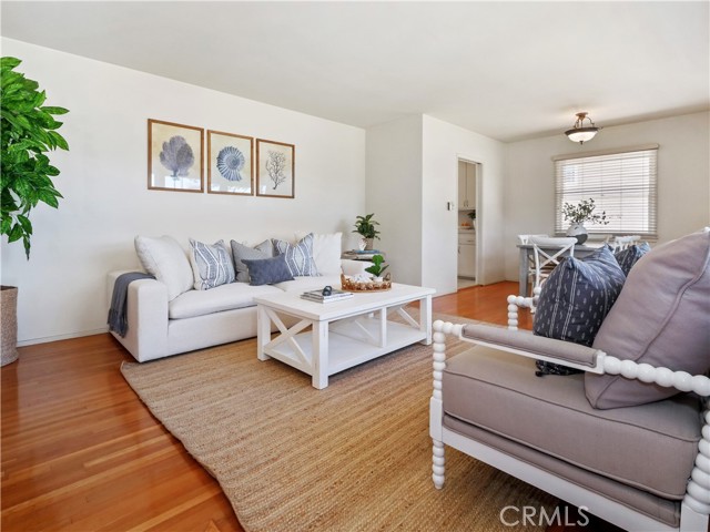 Entry from the front door into the living room and dining room.