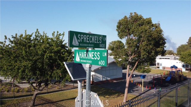 Complex is at the corner of Spreckels and Harkness, driveway entrance is off of Harkness.