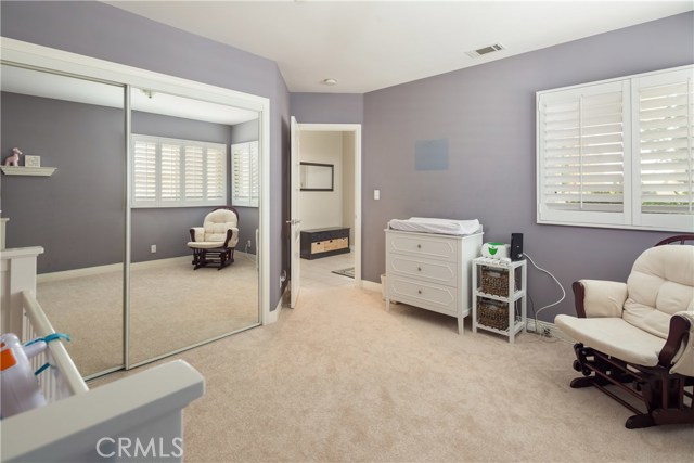 Downstairs bedroom with generous size closet looking towards entry Downstairs bedroom with generous size closet looking towards entry