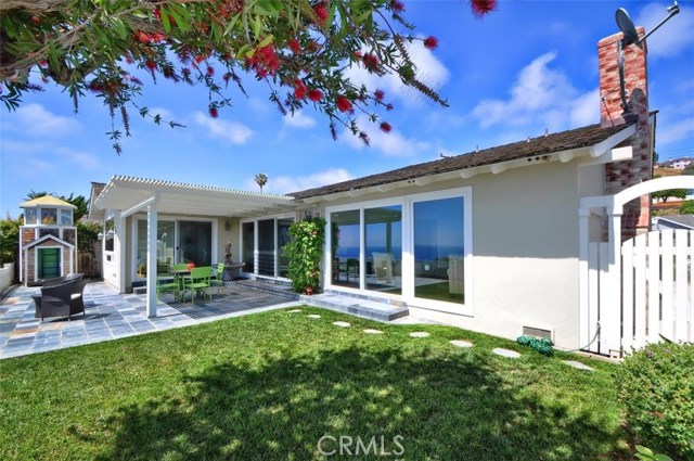 Grassy Backyard, Tiled Patio & Kid's Play House