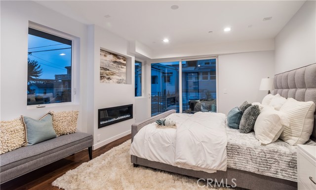 master bedroom with ocean view balcony