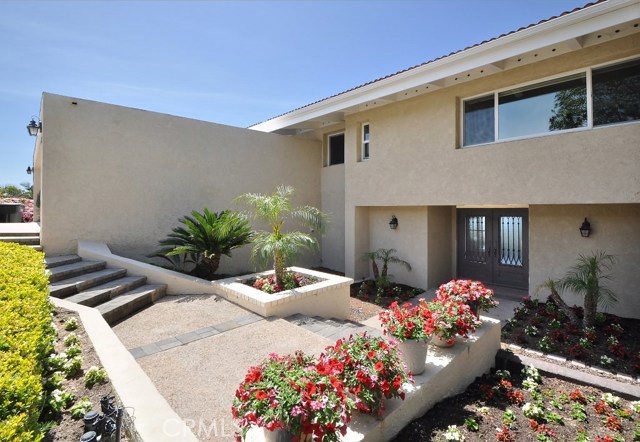 Lushly landscaped entry to this wonderful home.