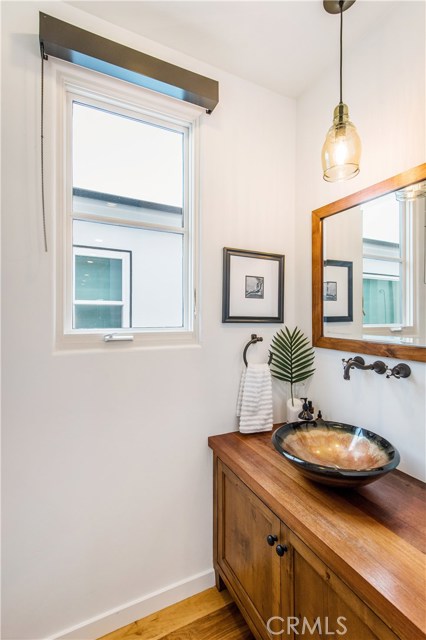 Lovely powder room on the upper level.